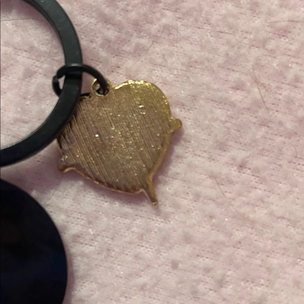 Source Unknown keychain red